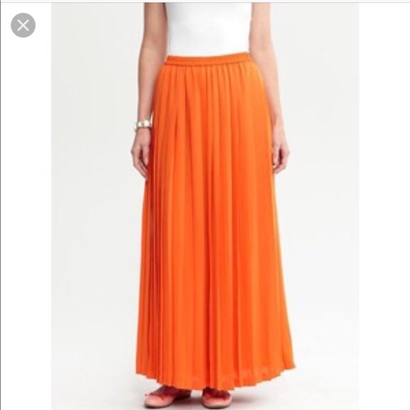 orange pleated maxi skirt